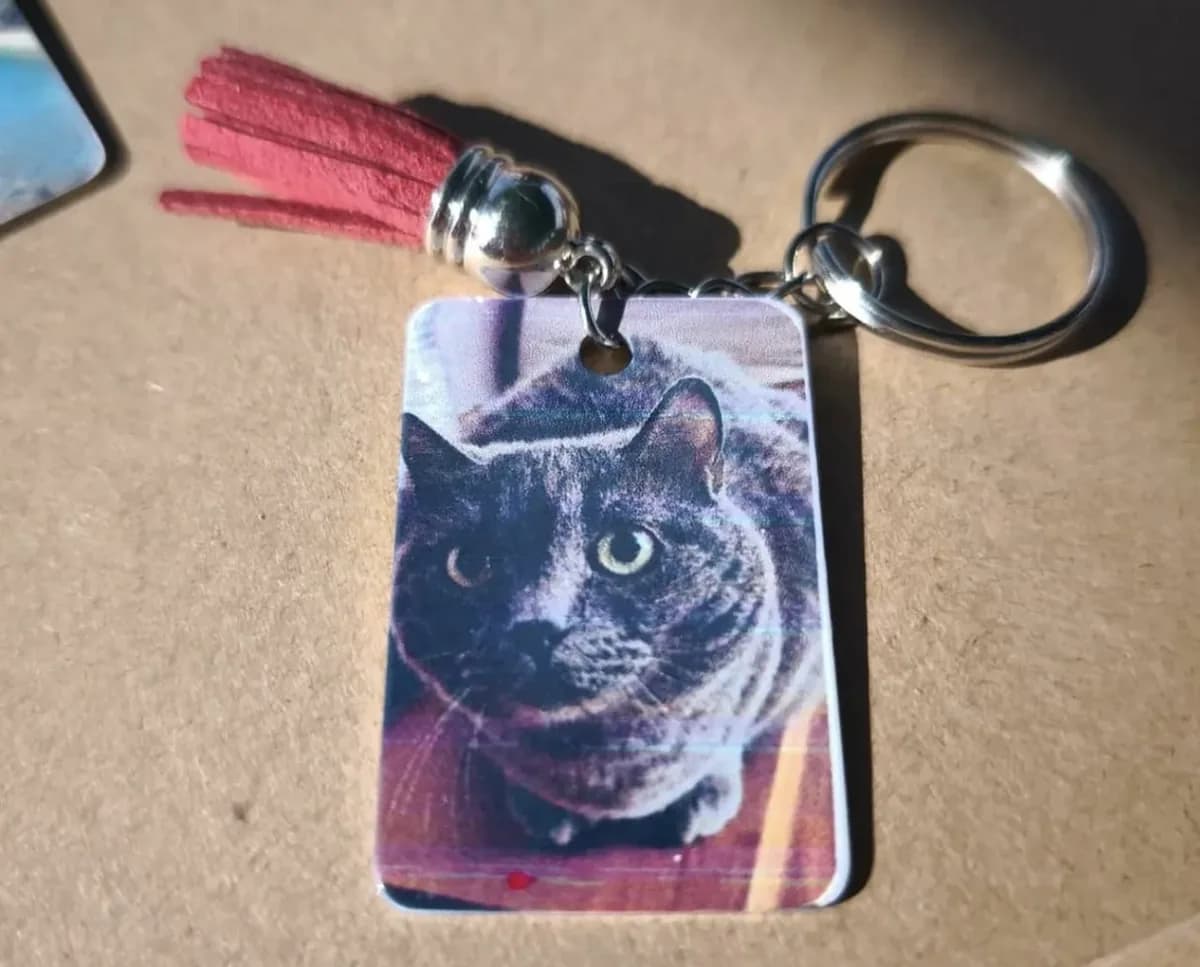 Llavero personalizado con la fotografía de Nami, la gata que dio nombre al taller